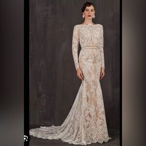 Exquisite Lace Bridal Gown in White with Crème Slip underneath.